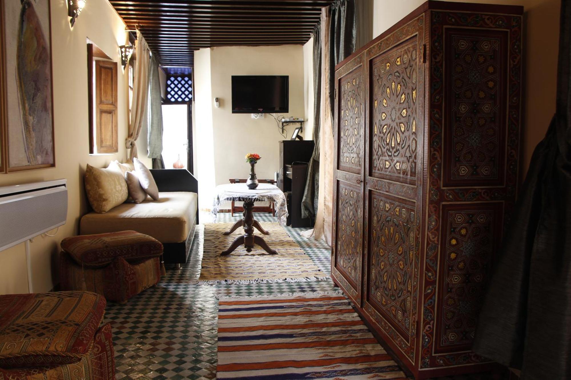 Riad Les Remparts De Fez Habitación foto